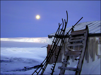 Moon over the Barne Glacier and Cape Evans hut