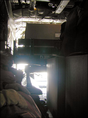 C-130 interior doing a cargo off-load